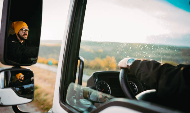 istock The truck driver is driving 1352482857