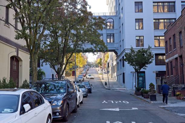 Old building converted to office space Brooklyn, NY, USA - Nov 10, 2021: The old Watchtower conversion into offices between Vine and Doughty Streets with a crossover connector above Columbia Heights warren street brooklyn stock pictures, royalty-free photos & images