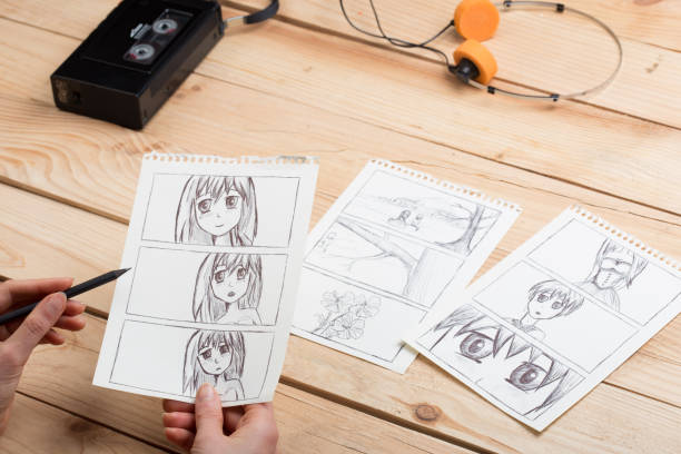 istock Artist drawing an anime comic book in a studio. 1352493612