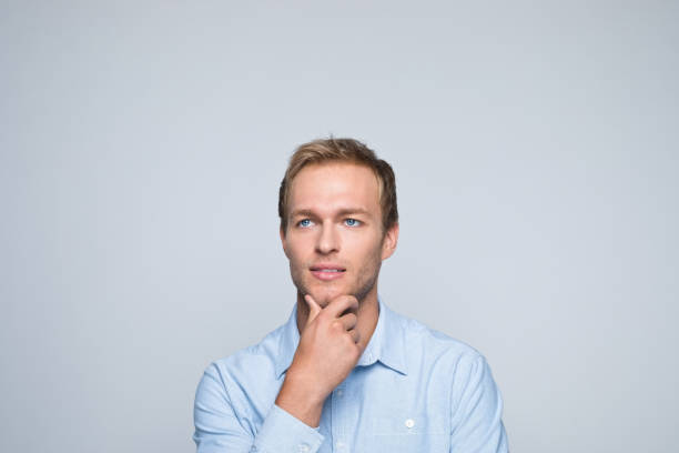 istock Headshot of thoughtful young businessman 1352494828