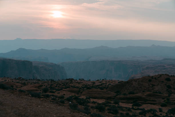 istock Sunset in desert. Scenic landscape with mountains and cloudy sky background, copy space for text 1352494928