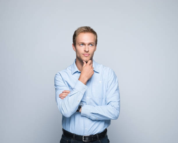 istock Portrait of thoughtful young businessman 1352495521