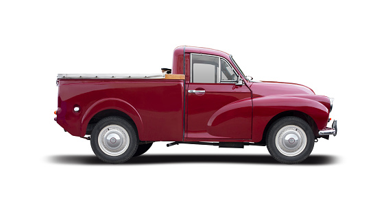Classic British pick-up truck side view isolated on white background