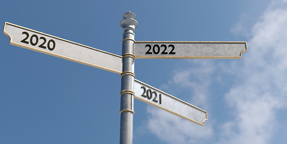 3D Sign of year dates from 2020 to 2022 on a blue sky background
