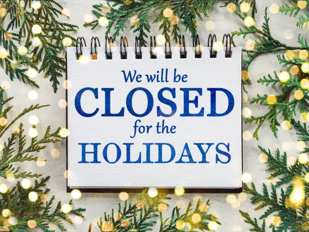 Photo of We'll be closed for the holidays. Signboard