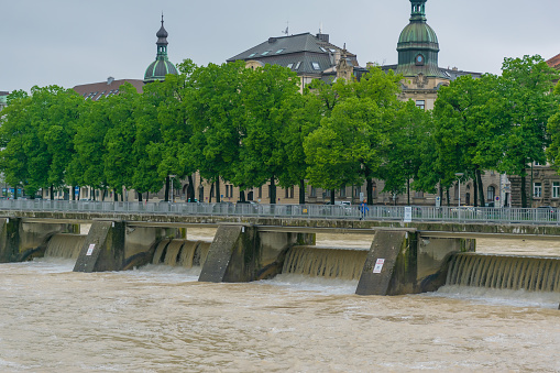 22 May 2019 - Isar river during high water. Blooming chestnuts in springtime