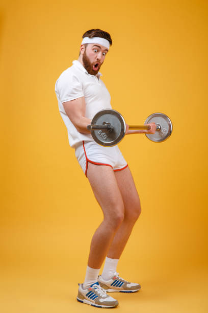 istock Portrait of a young bearded fitnes man doing workout 1352505437