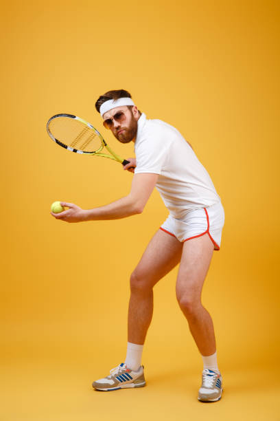 istock Attractive young tennis player wearing glasses 1352505473