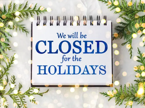 Photo of We'll be closed for the holidays. Signboard