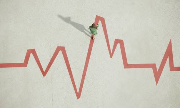 Woman walking on painted pulse trace graph