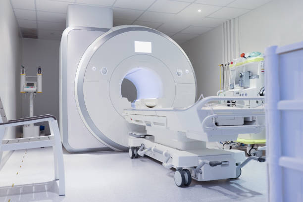 istock Nuclear magnetic resonance imaging laboratory with high technology contemporary equipment 1352506473