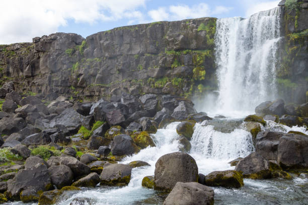 istock Oxararfoss waterfall summer day view, Thingvellir, Iceland 1352506644