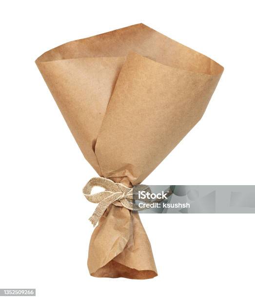 Empty Craft Paper Wrapping Cornet Tied With Beige Canvas Ribbon Isolated Stock Photo - Download Image Now