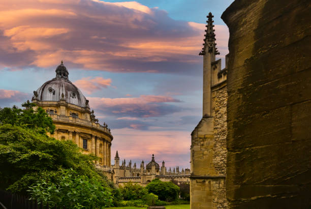 The Radcliffe Camera with the Bodleian library buildings around it. stock photo