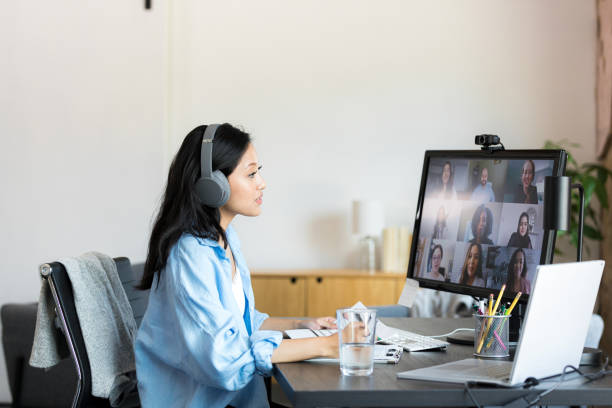 istock Attentive businesswoman attends virtual conference 1352511907
