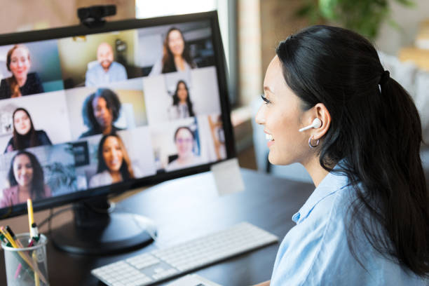 istock Young woman talks with friends via video chat 1352511919
