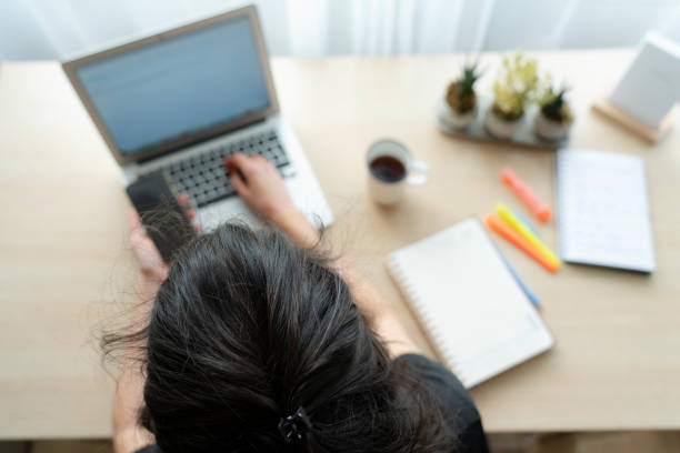 istock Modern woman working at home 1352512256