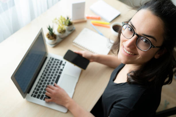 istock Young woman working from home 1352512968