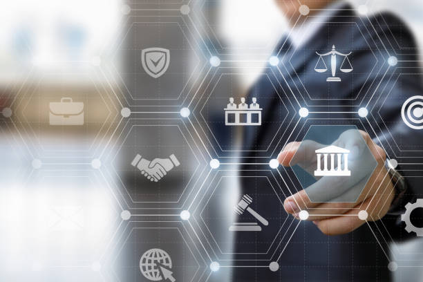 istock Lawyer clicks on the court icon on a virtual computer screen. 1352513047