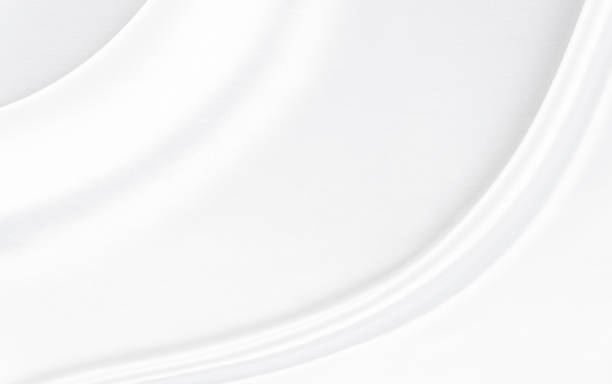 istock White gray satin texture that is white silver fabric silk background with beautiful soft blur pattern natural. 1352513652