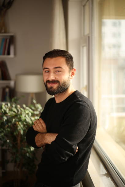 istock Portrait of smiling handsome man 1352514730