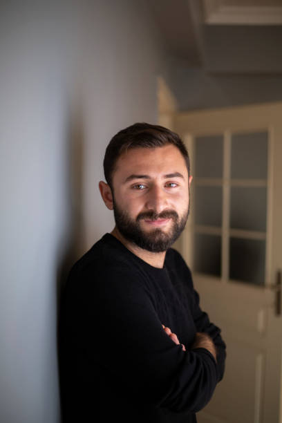 istock Portrait of smiling handsome man 1352514790