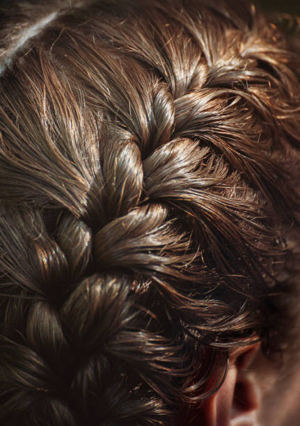 istock Braided Wavy Brown Hair 1352515693