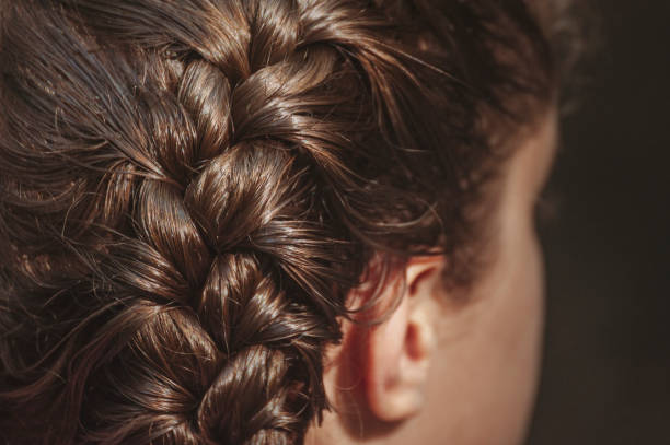 istock Braided Wavy Brown Hair 1352515757