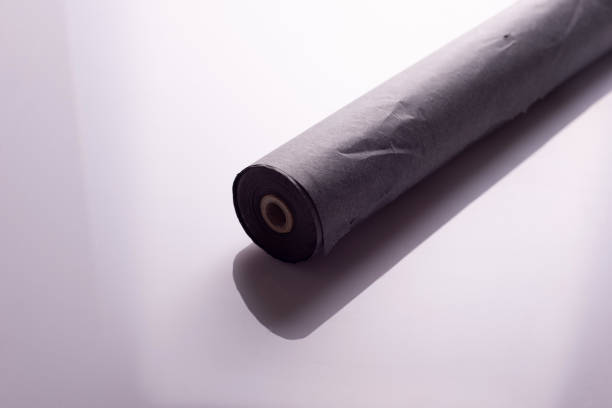 istock roll of black carbon paper tape on white background 1352516637