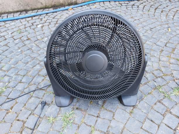 istock Electric fan at the sidewalk 1352520720