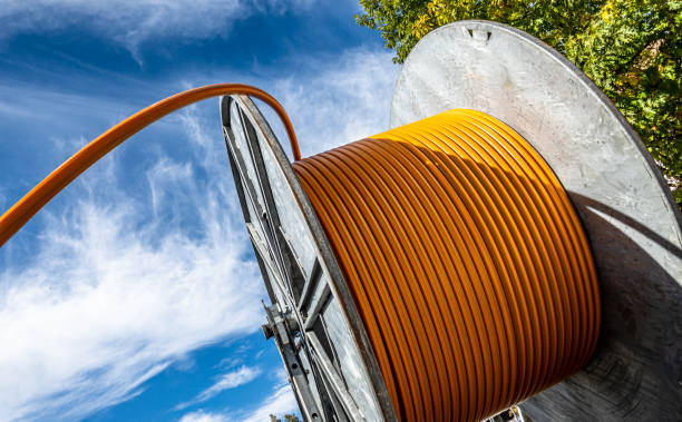 cable drum at a construction site cable drum at a construction site - photo new big tube stock pictures, royalty-free photos & images