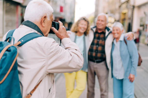 istock Active seniors walking in the city 1352526078