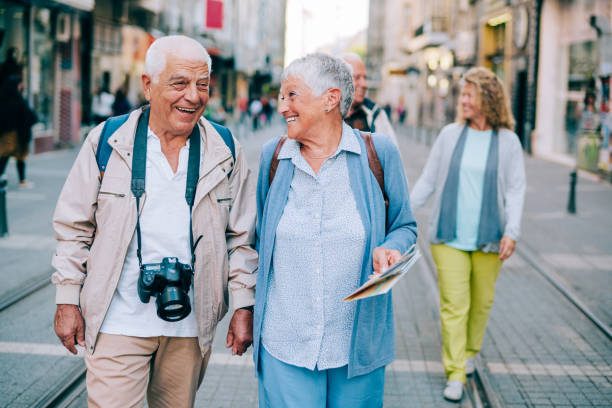 istock Active seniors walking in the city 1352526121