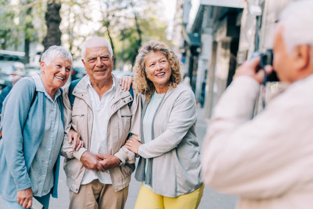 istock Active seniors walking in the city 1352526122