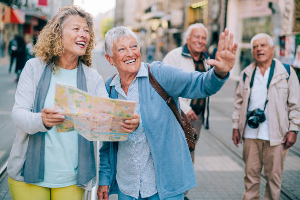 istock Active seniors walking in the city 1352526124