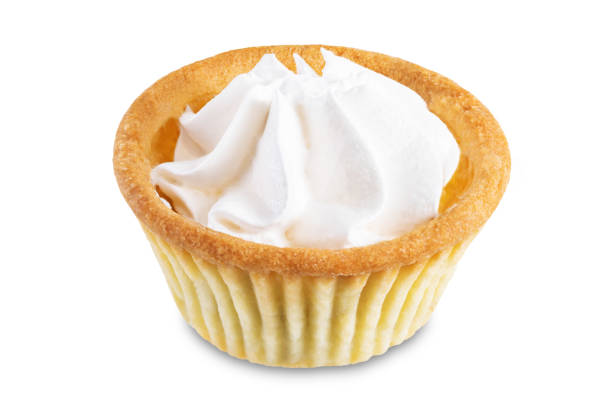 istock Sweet tartlets with cream on a white isolated background 1352530210