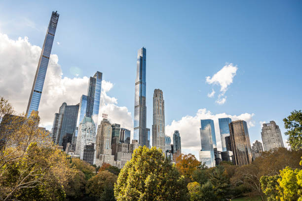 istock autumn central park and buildings 1352537068