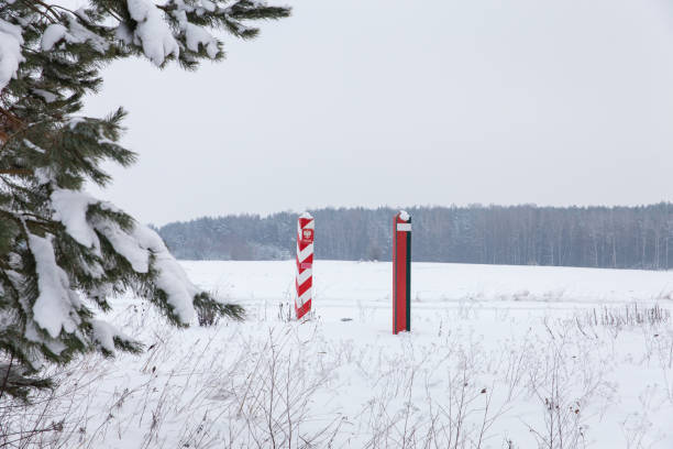 istock Boundary pillars of Belarus and Poland on the border 1352540491