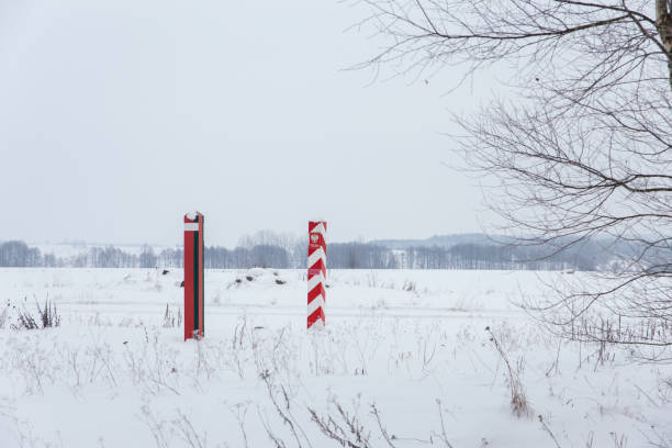 istock Boundary pillars of Belarus and Poland on the border 1352540533