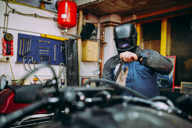 istock A mechanic welds a motorcycle 1352550820