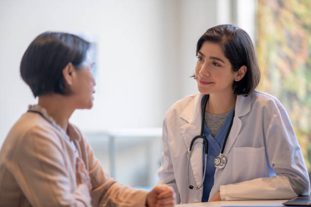 istock Senior Patient with Chest Pains 1352553835