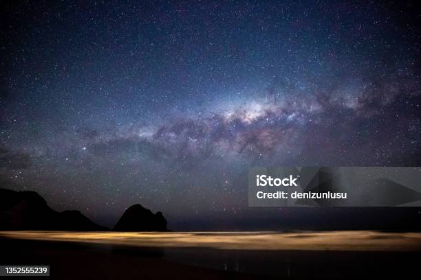 Piha Beach And Milky Way Galaxy At Night In Auckland New Zealand Stock Photo - Download Image Now