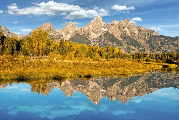istock The Teton Range Reflected in the Snake River 1352556845