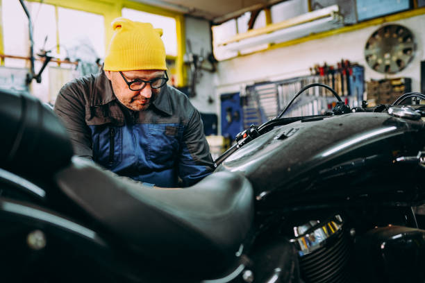 istock A mechanic repairs the bike 1352556975