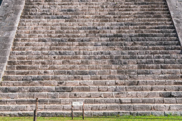 istock Close up of the Stairway on  El Castillo, Chichen Itza 1352559539
