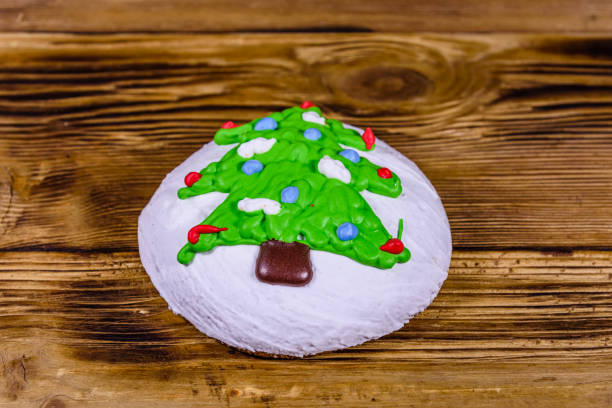 istock Christmas gingerbread cookie on the wooden table 1352559665