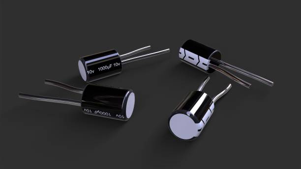 capacitor electronic component isolated on dark grey background 3dcg - 3dcg imagens e fotografias de stock