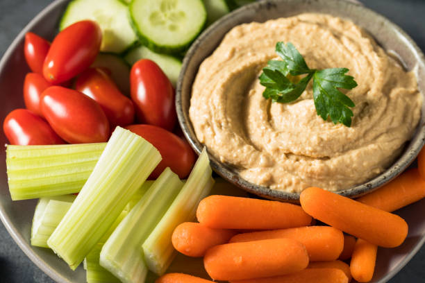 istock Healthy Homemade Veggie Hummus Plate 1352566561