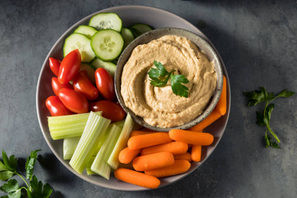 istock Healthy Homemade Veggie Hummus Plate 1352566569