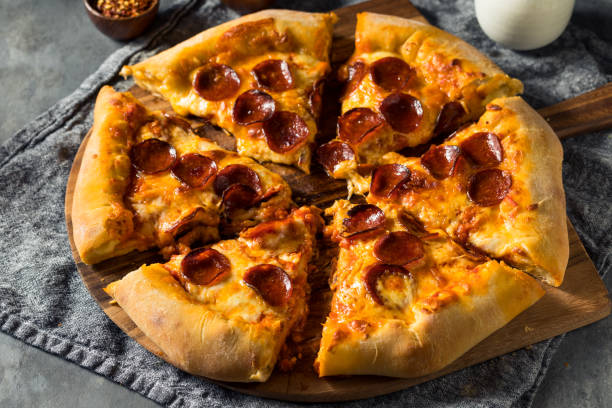 istock Homemade Pepperoni Stuffed Crust Pizza 1352566572